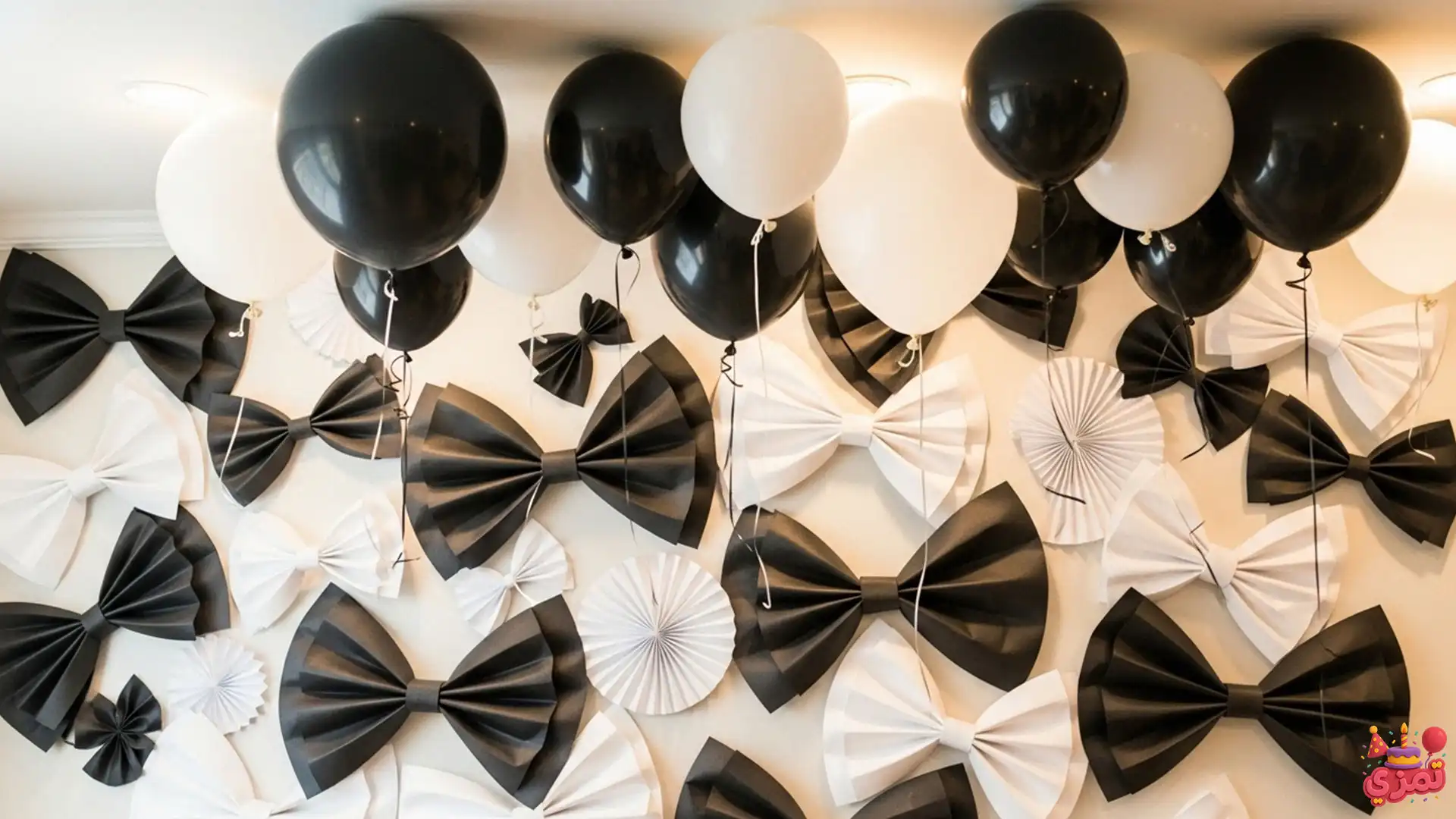 دکوراسیون تولد پسرانه با تم پاپیونی مشکی و سفید