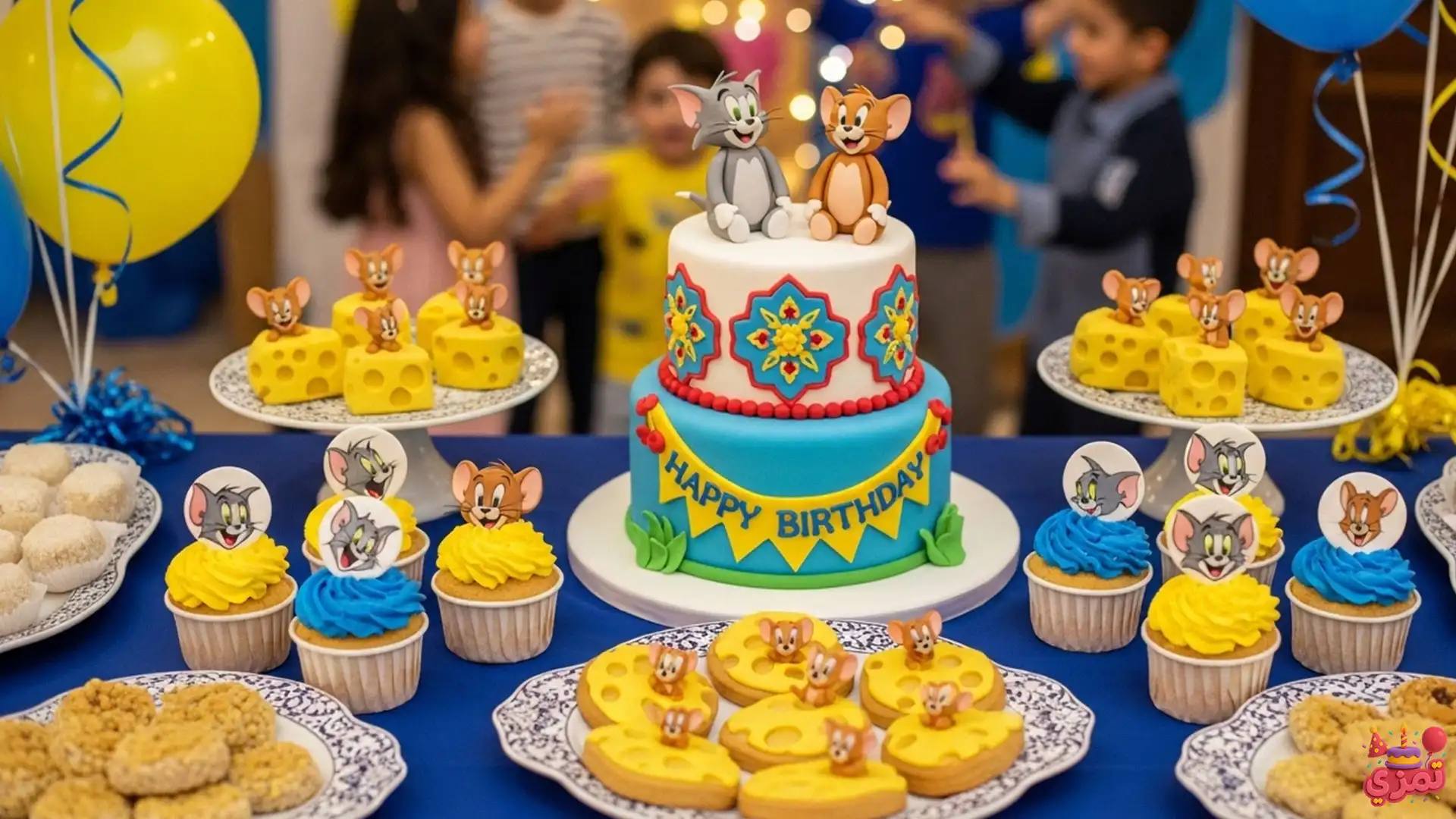 میز پذیرایی با کیک و دسرهای تم تولد تام و جری برای تمام سنین